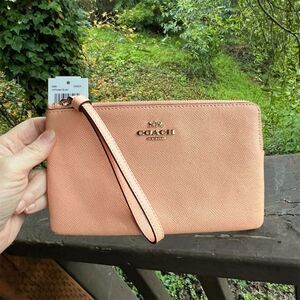 COACH Women's Large Corner Zip Phone Wristlet Faded Blush Leather Gold Hardware